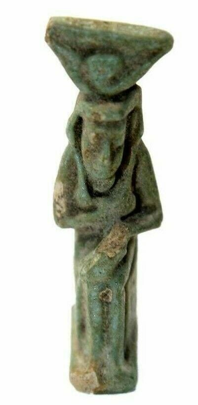 Ancient Egyptian Blue Faience Amulet Of Isis Late: Ancient Egyptian Blue Faience Amulet Of Isis Late Period, c.715-330 B.C. Size 24 mm. Fine Blue glazed faience Amulet of Isis seated on athrone holding the child Horus. Provenance: Ex Harlen Berk Chica