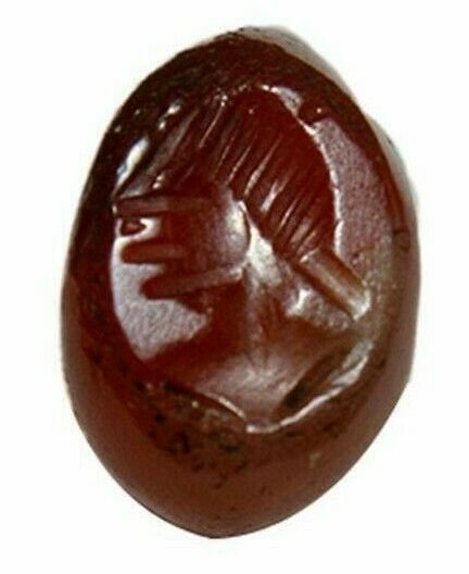 Ancient Sasanian Carnelian Stamp Seal c.3rd-7th century: Ancient Sasanian Carnelian Stamp Seal c.3rd-7th century AD. Size 13 x 10 mm. Fine Carnelian Seal carved with Bust facing right. Provenance: Ex Harlen Berk Chicago USA.
