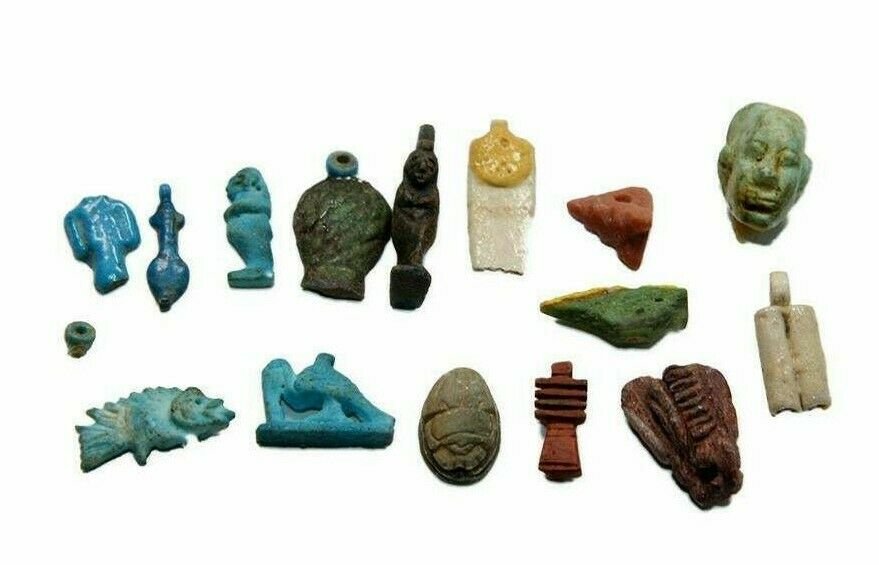 Lot of 15 Ancient Egyptian Faience, Stone Amulets Late: Lot of 15 Ancient Egyptian Faience, Stone Amulets Late Period c.664-332 BC. Size 14-23 mm. Great lot of 15 mixed Egyptian faience and stone amulets. all with great quality and details. Provenance: Ex 