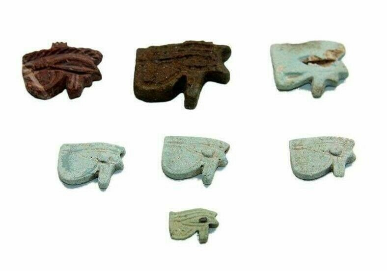 Lot of 7 Ancient Egyptian Faience Eye Of Horus Amulets: Lot of 7 Ancient Egyptian Faience Eye Of Horus Amulets Late Period c.664-332 BC. Size 12-23 mm. Great lot of 7 Egyptian faience Eye Of Horus amulets. all with great quality and details. Provenance: Ex