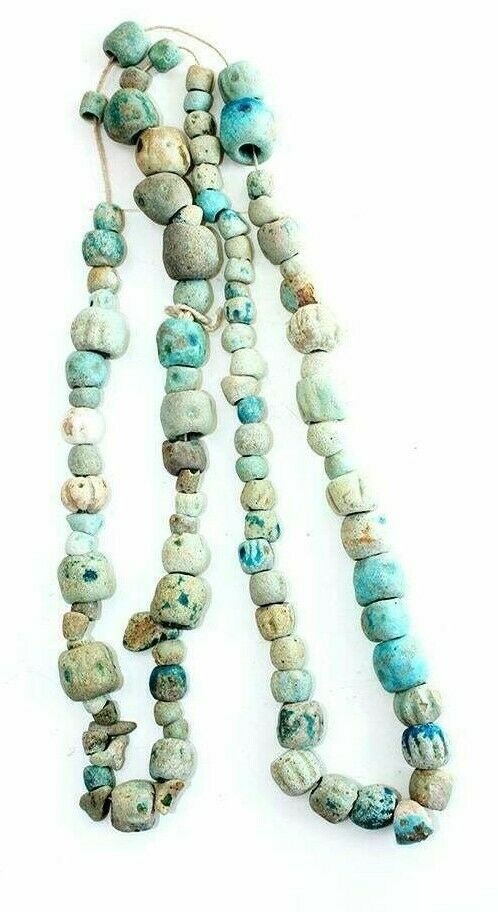 Lot of Ancient Islamic turquoise Ceramic Beads c.8th: Lot of Ancient Islamic turquoise Ceramic Beads c.8th century AD. Size of the strand 50 inches length. size of each bead 10 - 18 mm. Beautiful large size turquoise color ceramic beads in a strand. Ex N