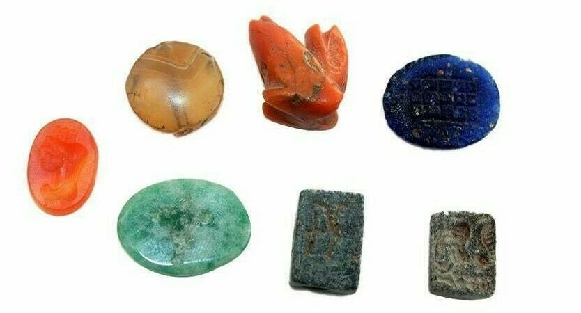 Lot of 7 Ancient Roman Itaglio Seals c.1st-4th century: Lot of 7 Ancient Roman Itaglio Seals c.1st-4th century AD. Size 13 - 18 mm. Fine Ancient Roman Intaglio carved with bust of a woman wearing crown facing left, together with three plain sone and glass 