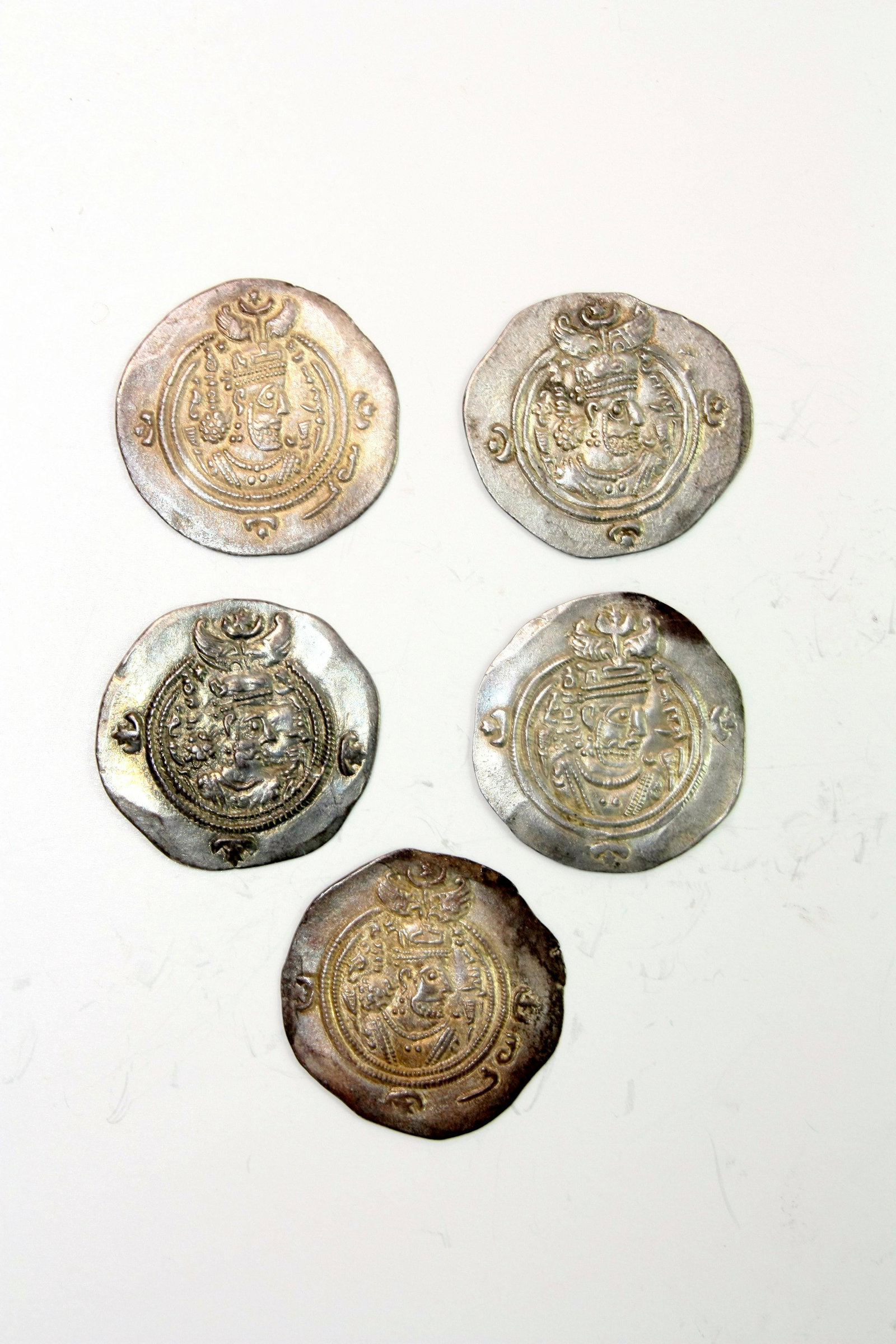 Lot of 5 Ancient Sasanian Kings. Khusro II (590-628 AD): Lot of 5 Ancient Sasanian Khusro II Drachms. Sasanian Kings. Khusro II (590-628 AD). AR Drachm (33mm, 4.09 gms) Obv. Crowned and cuirassed bust right, two stars above crest; double border of dots, thr