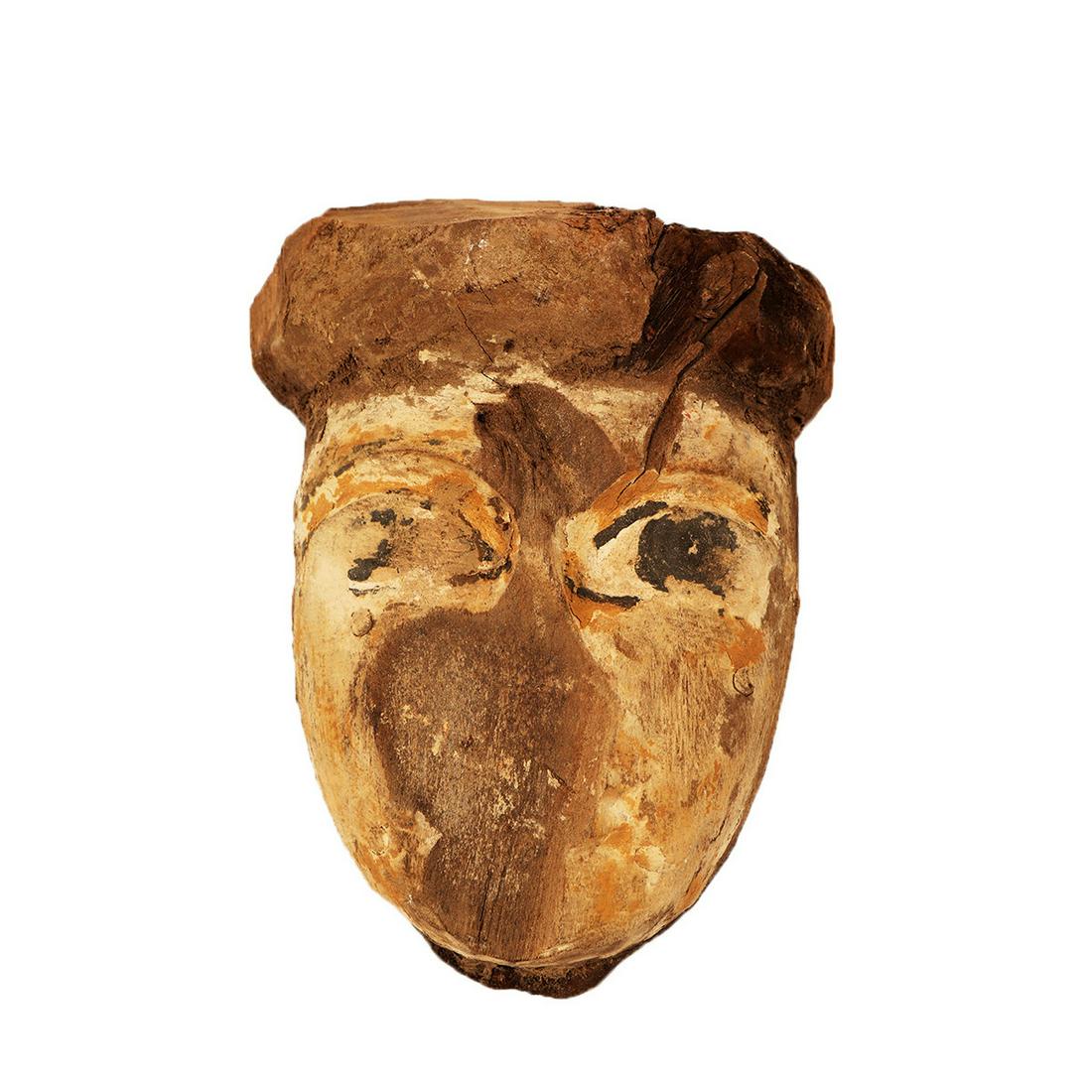 Ancient Egyptian Mummy Wood Mask c.664-332 BC.: Ancient Egyptian Mummy Wood Mask c.664-332 BC. Size 6 3/4 inches high x 5 inches wide. Ancient Egyptian Mummy Wood Mask painted in yellow, black and white over gesso. Provenance: Private NYC collectio