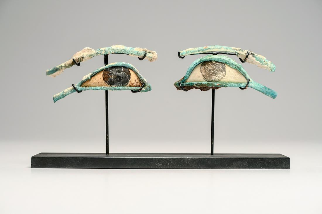 A Massive Ancient Egyptian Bronze Eyes Ca. 1000-300: A Massive Ancient Egyptian Bronze Eyes Ca. 1000-300 B.C. Size 5 inches Wide each. A very large oversized Set of bronze framed eyes, originally from a mummy mask, with separately cast bronze brows. Bot
