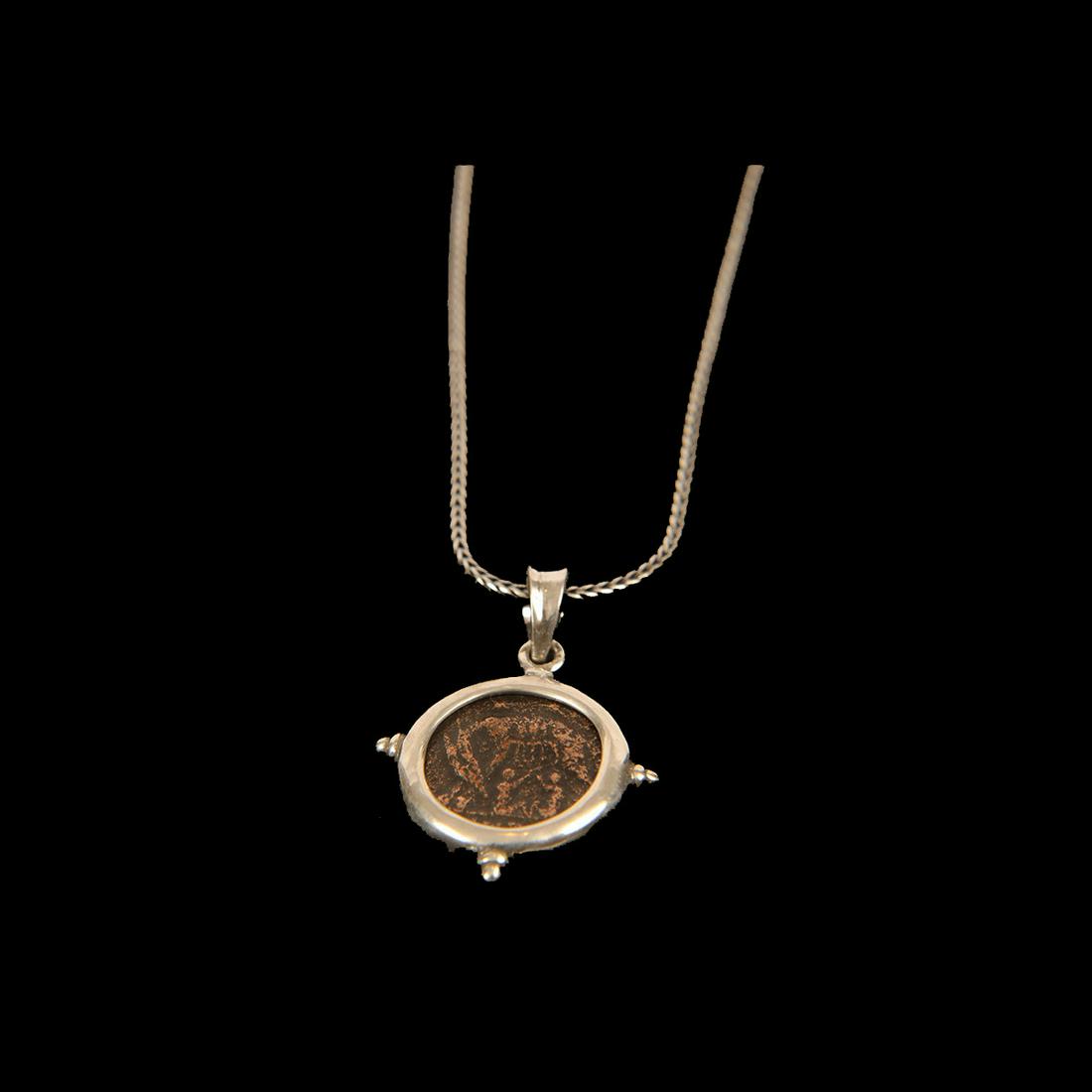 Ancient Roman bronze coin Constantine set in Silver: Ancient Roman bronze coin Constantine set in Silver Necklace. Size 16 inches length of necklace + extension. Ancient Roman bronze coin Constantine The Great, SHE WOLF Twins ROMULUS REMUS. 350 AD. Set 