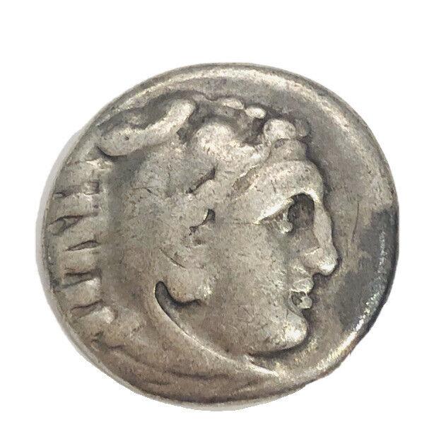 KINGS of MACEDON. Alexander III â€˜the Greatâ€™.: KINGS of MACEDON. Alexander III â€˜the Greatâ€™. 336-323 BC. AR Drachm (17 mm, 4.13 g,). Kolophon mint. Struck under Philip III, circa 322-319 BC. Head of Herakles right, wearing lion skin he
