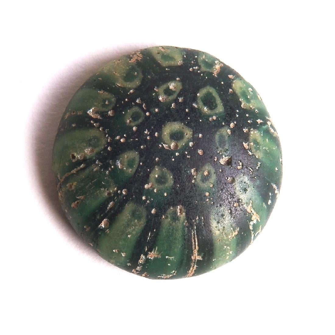 Ancient Roman Egypt Mosaic Glass Weight c.2nd cent AD.: Ancient Roman Egypt Mosaic Glass Weight c.2nd cent AD. Size 19 mm. Rare Green Mosaic Millefiori Glass Weight. condition: Perfect. Provenance: Ex The Time Machine New York City. Acquired from USA Colle