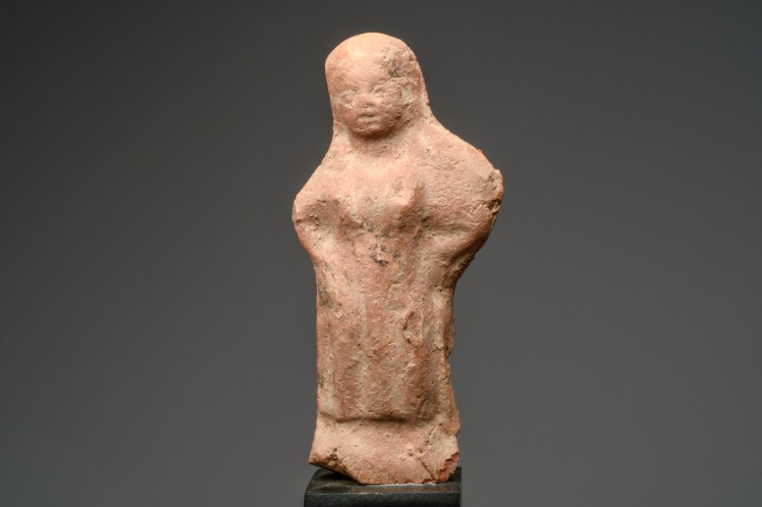 Ancient Roman Egyptian Terracotta Aphrodite ca. 100 A.D: Ancient Roman Egyptian Terracotta Aphrodite ca. 100 A.D.Size:6 inches High. x 2-3/4 inches w. Natural orange-brown molded pottery figure depicted wearing a long chiton, hands held to waist. Mineral de