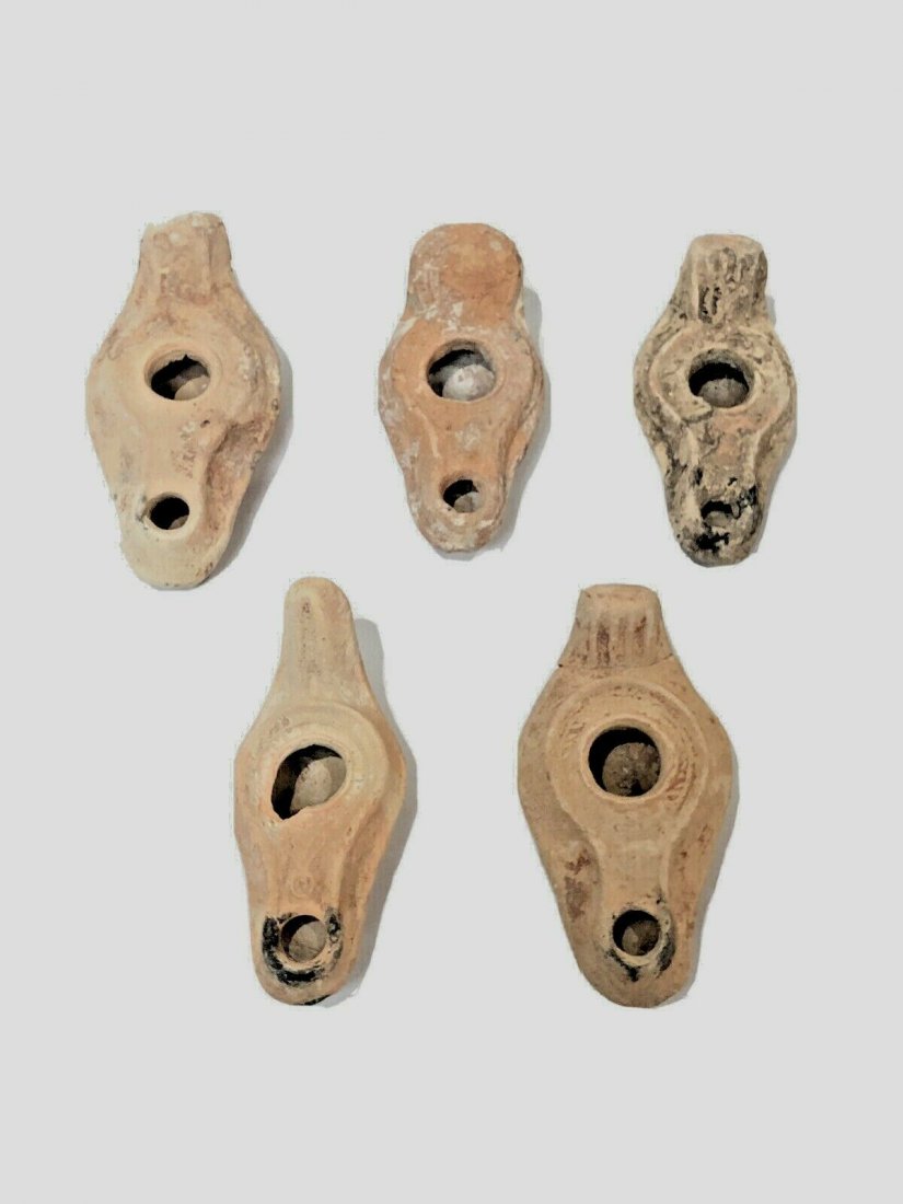 Lot of 5 Ancient Roman, Byzantine Terracotta Oil Lamps: Lot of 5 Ancient Roman, Byzantine Terracotta Oil Lamps c.1st-5th century AD. Size 4 - 4 3/4 inches length. Great lot of 5 Ancient Roman and Byzantine period terracotta oil lamps. Provenance: From Priv