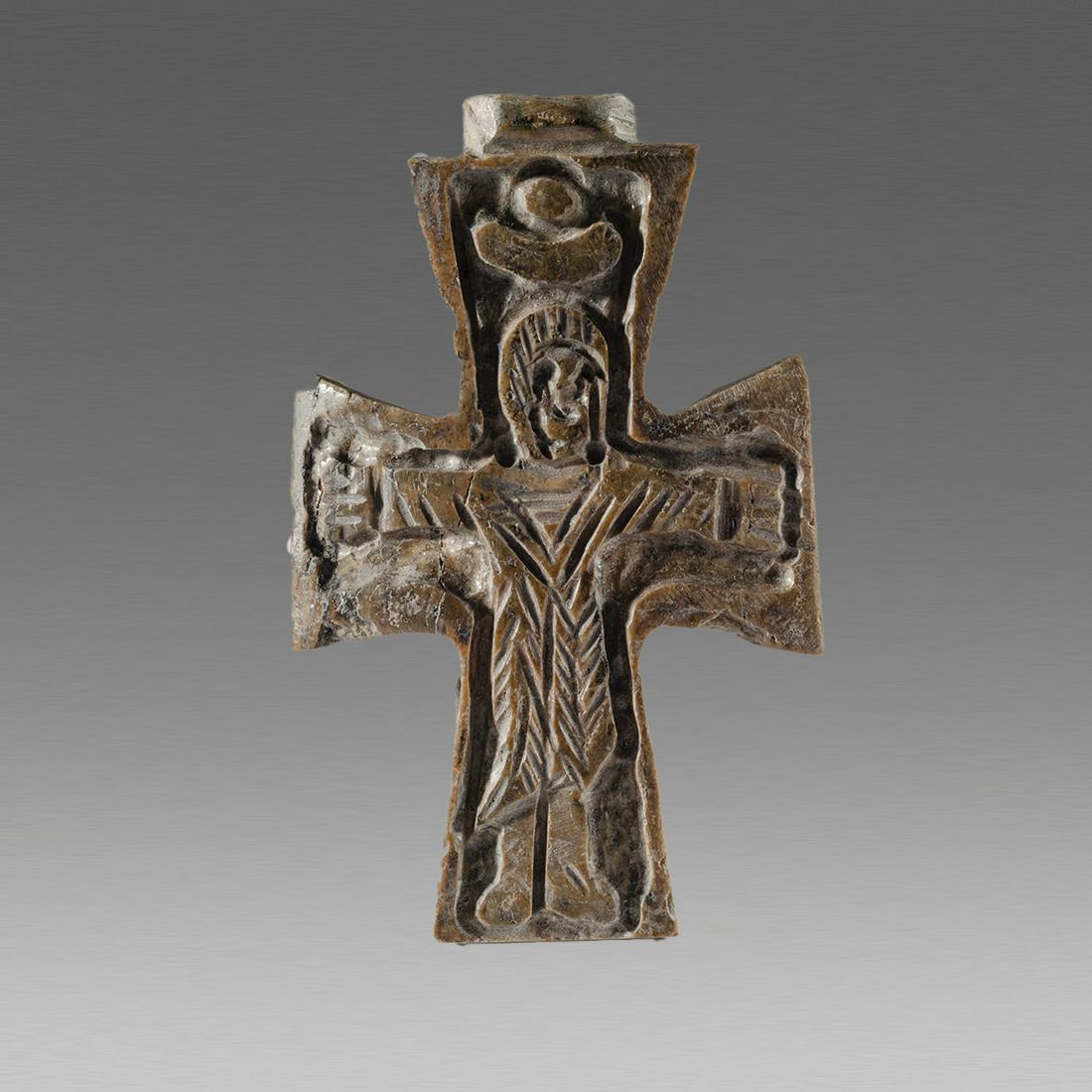 Antique Coptic Ethiopian Bone Cross c.19th cent AD.: Antique Coptic Ethiopian Bone Cross c.19th cent AD. size 2 1/2 inch length. Thick bone Cross decorated with Christ. suspension loop at top. wearable. Provenance: Ex Eldert Bontekoe, Pegasi. Ann Harbor