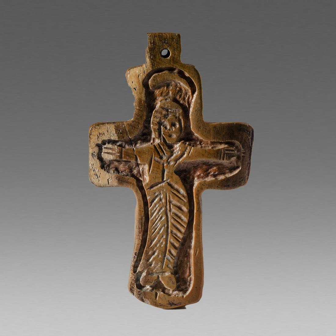 Antique Coptic Ethiopian Bone Cross c.19th cent AD.: Antique Coptic Ethiopian Bone Cross c.19th cent AD. size 2 3/4 inch length. Thick bone Cross decorated with Christ. suspension loop at top. wearable. Provenance: Ex Eldert Bontekoe, Pegasi. Ann Harbor