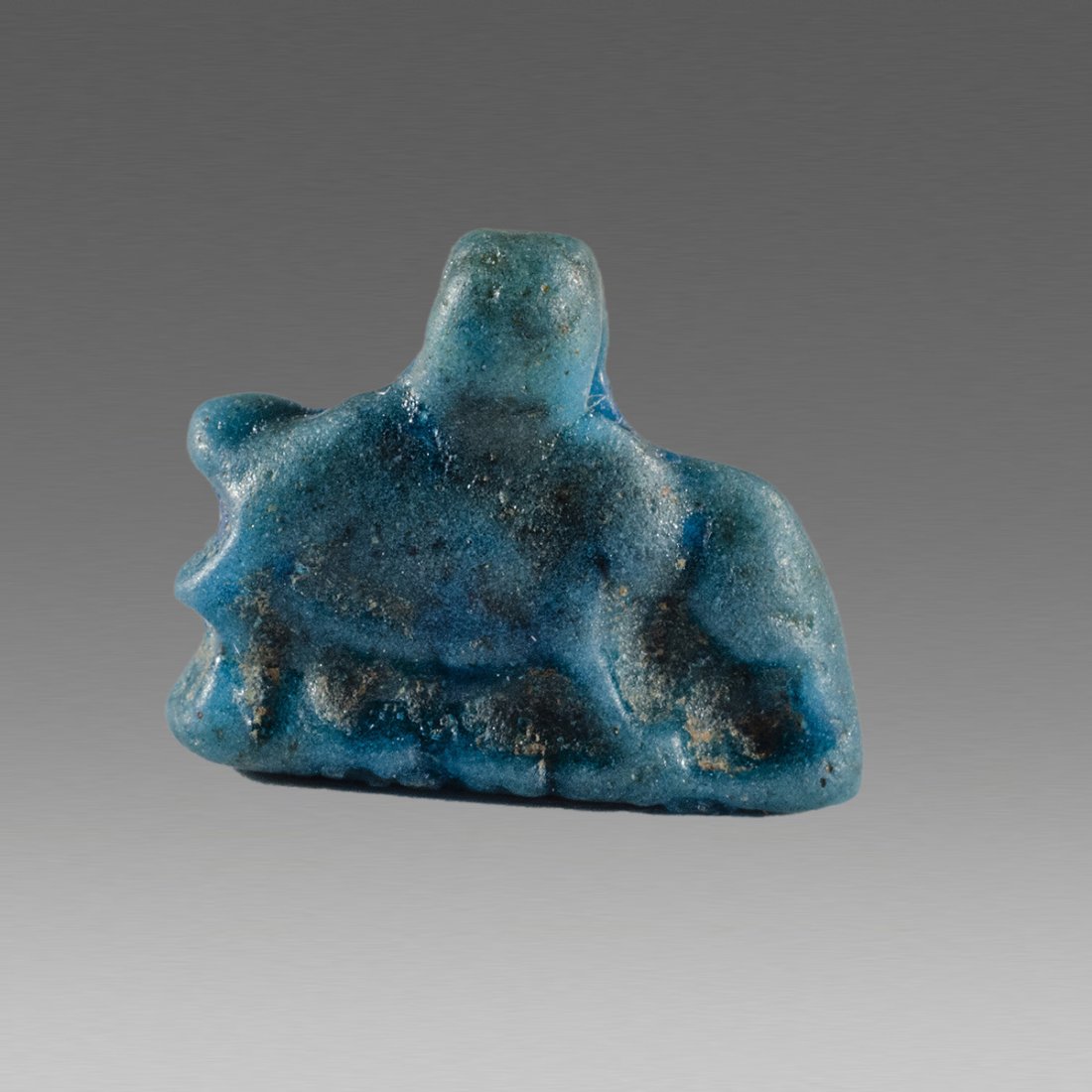 Ancient Egyptian Faience Amulet of Anteater c.663-525: Ancient Egyptian Faience Amulet of Anteater c.663-525 BC. Size 12 mm. Blue glazed faience amulet of an anteater with rectangular base and suspension loop at top. Provenance: Ex Eldert Bontekoe, Pegasi