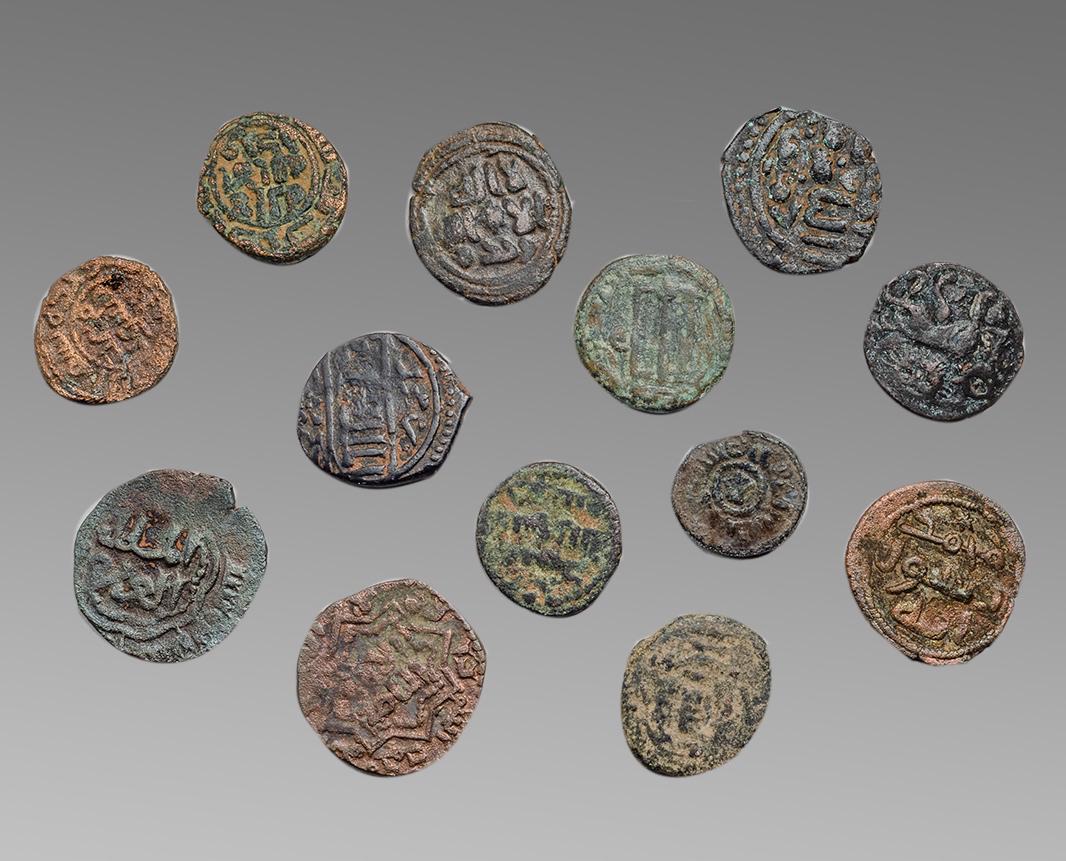 Lot of 13 Ancient Islamic bronze coins c.7th-15th (1 of 2)