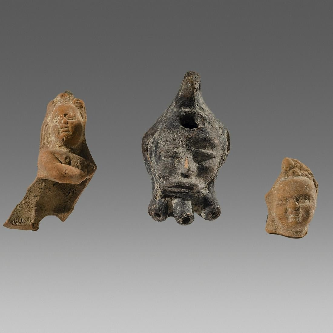 Lot of 3 Ancient Roman Alexandria figures fragments c.1: Lot of 3 Ancient Roman Alexandria figures fragments c.1st- 2nd century AD. Size 3 1/2 - 2 inches length. Roman Egypt Alexandria Terracotta Harpokrates, fragments from full figure, together with a figu
