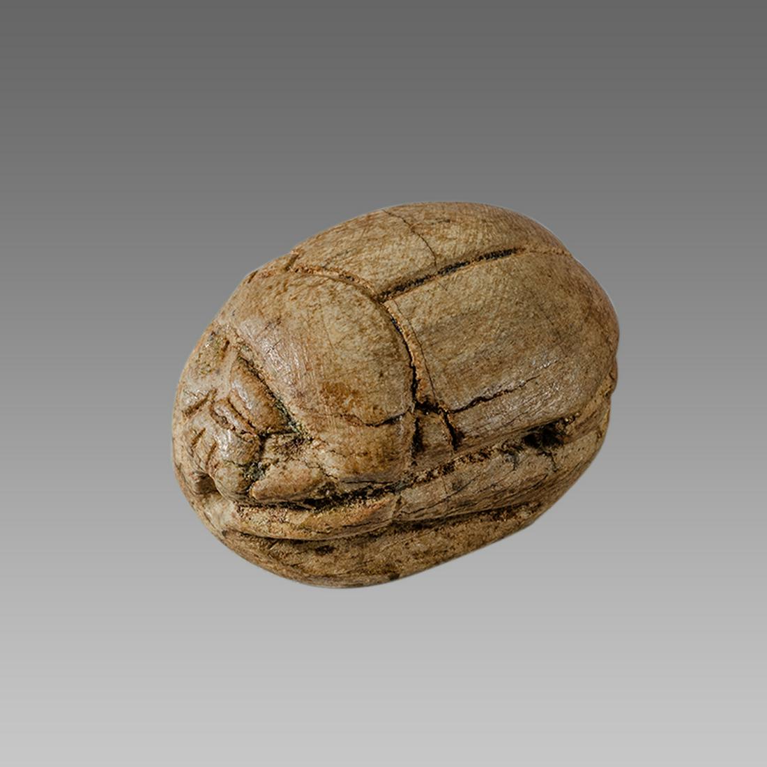 Ancient Egyptian Steatite stone Scarab c.1500-1100 BCE.: Ancient Egyptian Steatite stone Scarab c.1500-1100 BCE. Size 23 x 16 mm. Glazed steatite scarab New Kingdom with stealized beatle back. Provenance: Ex Secret Eyes Gallery New York 1970's-1980's.