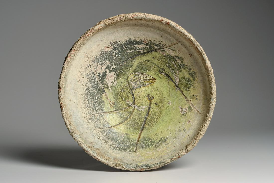 Ancient Byzantine Sea Salvaged Glazed & Decorated Bowl: Ancient Byzantine Sea Salvaged Glazed & Decorated Bowl Ca. 5th century A.D. Size 11 inches diameter x 3 5/8 inches high. Thick walled pottery bowl standing on a low ring base. Mottled pale and dark gr