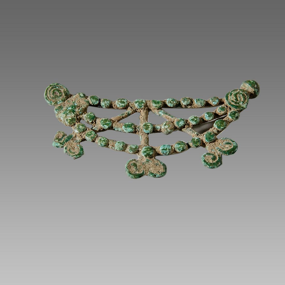 Ancient Roman Bronze Fibula c.1st-3rd century AD.: Ancient Roman Bronze Fibula c.1st-3rd century AD. Size 3 1/4 inches length. Cast bronze fancy crecent moon form with raised dots design. Provenance: Ex Eldert Bontekoe, Pegasi. Ann Arbor Michigan, USA