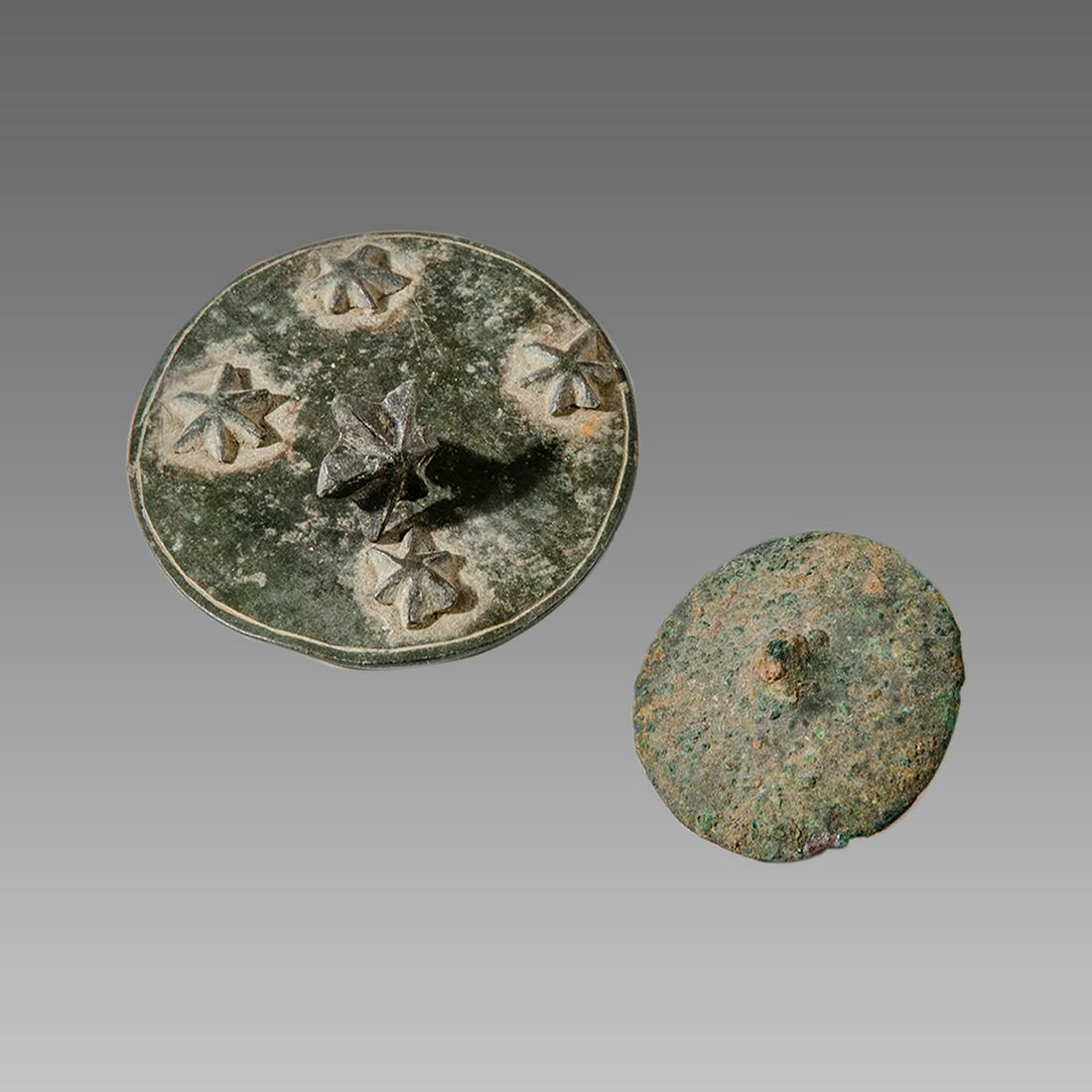 Lot of 2 Roman/Byzantine Bronze shield boss c.1400 AD.: Lot of 2 Roman/Byzantine Bronze shield boss c.1400 AD. Size 2 1/8 - 1 1/4 inches diameter. Late Byzantine period Bronze shield boss decorated with star-shaped studs toghether with cast bronze Shield b