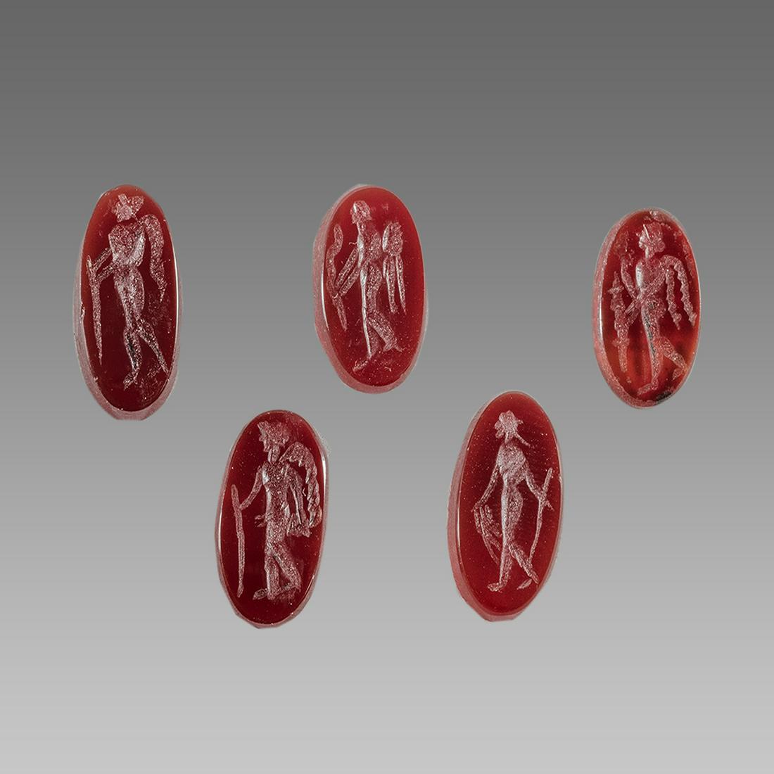 Lot of 5 Roman Style Carnelian Intaglios.: Lot of 5 Roman Style Carnelian Intaglios. Size 15-17 mm. lot of 5 carnelian intaglio engraved with figures. Provenance: Ex Eldert Bontekoe, Pegasi. Ann Arbor Michigan, USA.