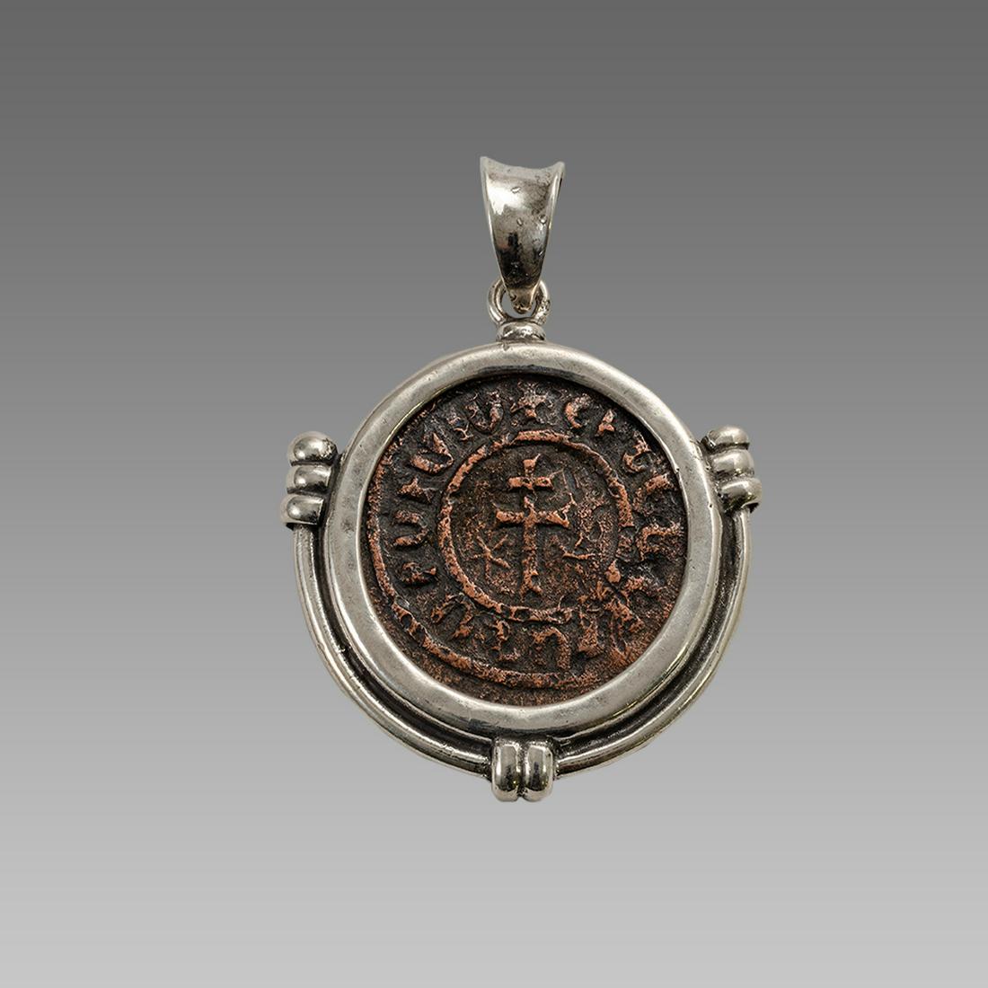 Ancient Armenia Bronze Coin Set in Silver Pendant.: Ancient Armenia Bronze Coin Set in Silver Pendant. Size 36 mm diameter, 2 1/8 inches with the suspension loop. Ancient Armenia bronze coin Levon I 1200 AD. Set in Modern Silver pendant. The coin is an