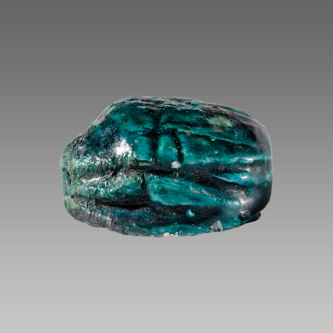 Ancient Egyptian Steatite stone Scarab c.1500-1100 BCE.: Ancient Egyptian Steatite stone Scarab c.1500-1100 BCE. Size 15 x 12 mm. Glazed steatite scarab New Kingdom with stealized beatle back. Provenance: Ex Secret Eyes Gallery New York 1970's-1980's.