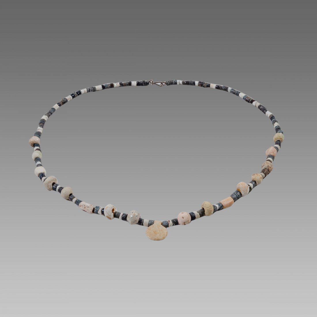 Ancient Near Eastern Mixed Stone Beads Necklace c.600: Ancient Near Eastern Mixed Stone Beads Necklace c.600 BC. Size 24 inches length. black and white stone bead necklace. wearable. Private NYC acquired prior 2000