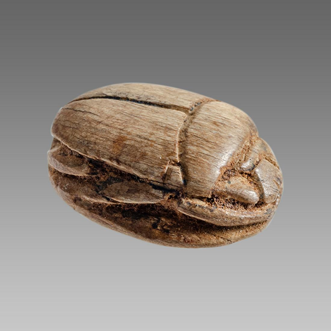 Ancient Egyptian Steatite stone Scarab c.1500-1100 BCE.: Ancient Egyptian Steatite stone Scarab c.1500-1100 BCE. Size 21 x 15 mm. Glazed steatite scarab New Kingdom with stealized beatle back. Provenance: Ex Secret Eyes Gallery New York 1970's-1980's.