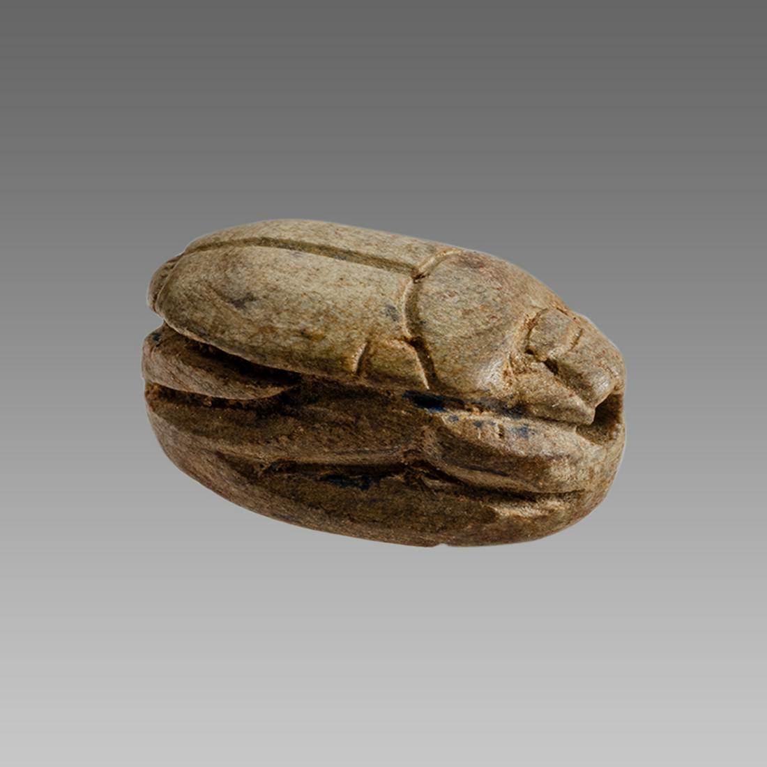 Ancient Egyptian Steatite stone Scarab c.1500-1100 BCE.: Ancient Egyptian Steatite stone Scarab c.1500-1100 BCE. Size 17 x 12 mm. Glazed steatite scarab New Kingdom with stealized beatle back. Provenance: Ex Secret Eyes Gallery New York 1970's-1980's.