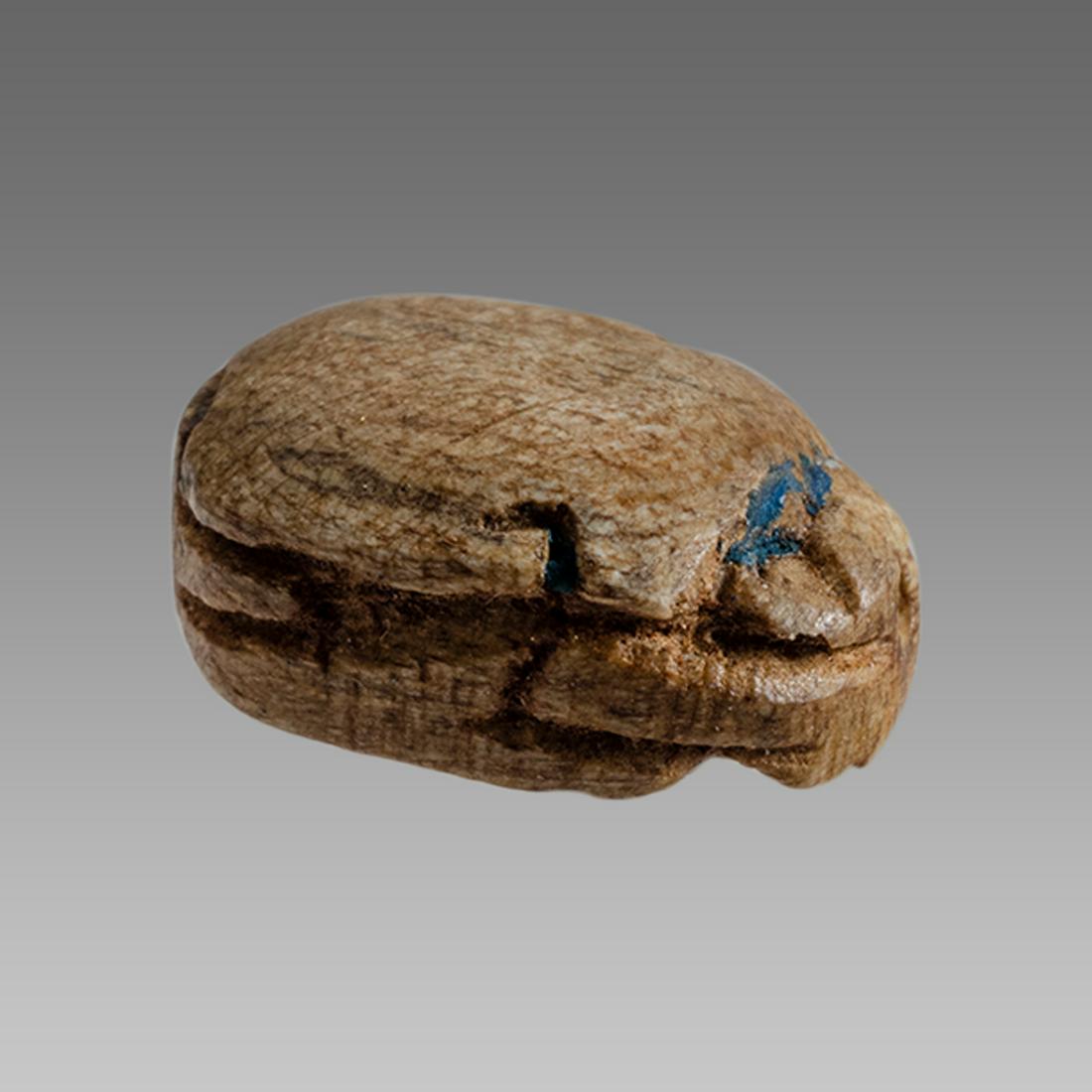 Ancient Egyptian Steatite stone Scarab c.1500-1100 BCE.: Ancient Egyptian Steatite stone Scarab c.1500-1100 BCE. Size 15 x 10 mm. Glazed steatite scarab New Kingdom with stealized beatle back. Provenance: Ex Secret Eyes Gallery New York 1970's-1980's.