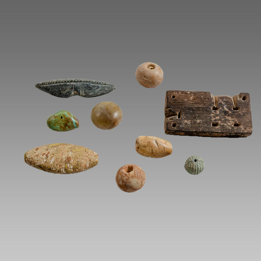 Lot of 9 Large Agate and Stone Beads.: Lot of 9 Large Agate and Stone Beads. Size 0 3/8 - 3 1/4 inches length. Carved large beads of different stone and type. age unkonwn? Ex Private New York city collection acquired in The New York Antiqu