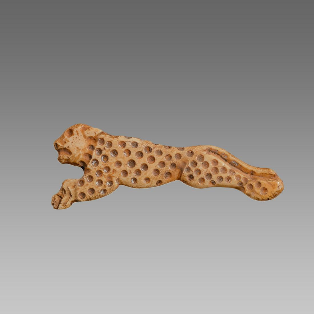 Roman Style Carved Bone Lion.: Roman Style Carved Bone Lion. Size 2 inches length + mount.Fine carved running leopard. custom mounted. Ex Private New York city collection acquired in The New York Antique market.