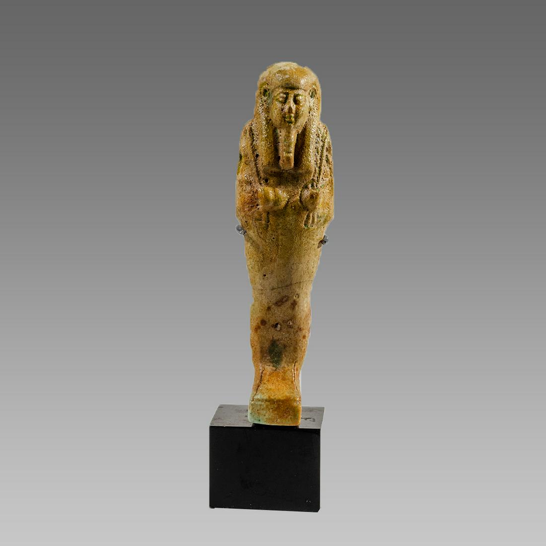 Ancient Egyptian Green Faience Ushabti Late period: Ancient Egyptian Green Faience Ushabti Late period c.664-332 BC. Size 4 inches high. + mount. Late Period, 26th Dynasty, ca. 664 to 332 BCE. fine green faience ushabti, mummiform figure standing on re
