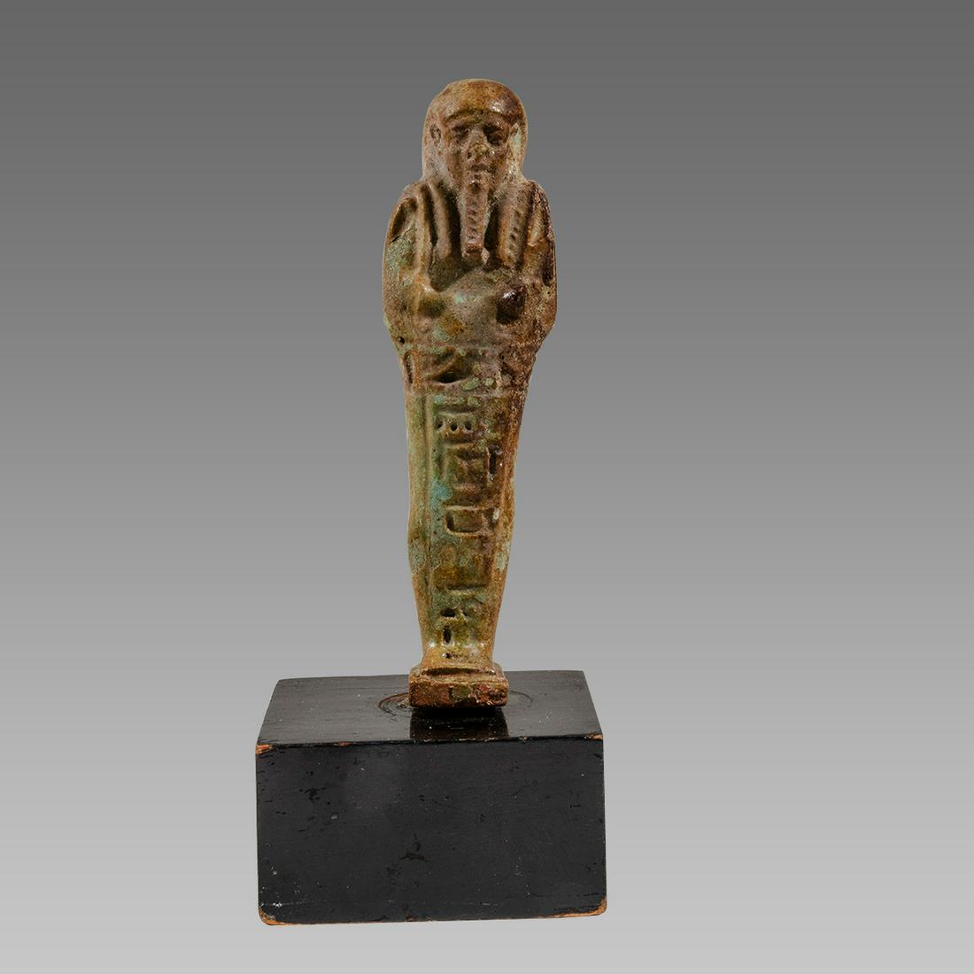 Ancient Egyptian Green Faience Ushabti Late period: Ancient Egyptian Green Faience Ushabti Late period c.664-332 BC. Size 4 3/8 inches high. + mount. Late Period, 26th Dynasty, ca. 664 to 332 BCE. fine green faience ushabti, mummiform figure standing o