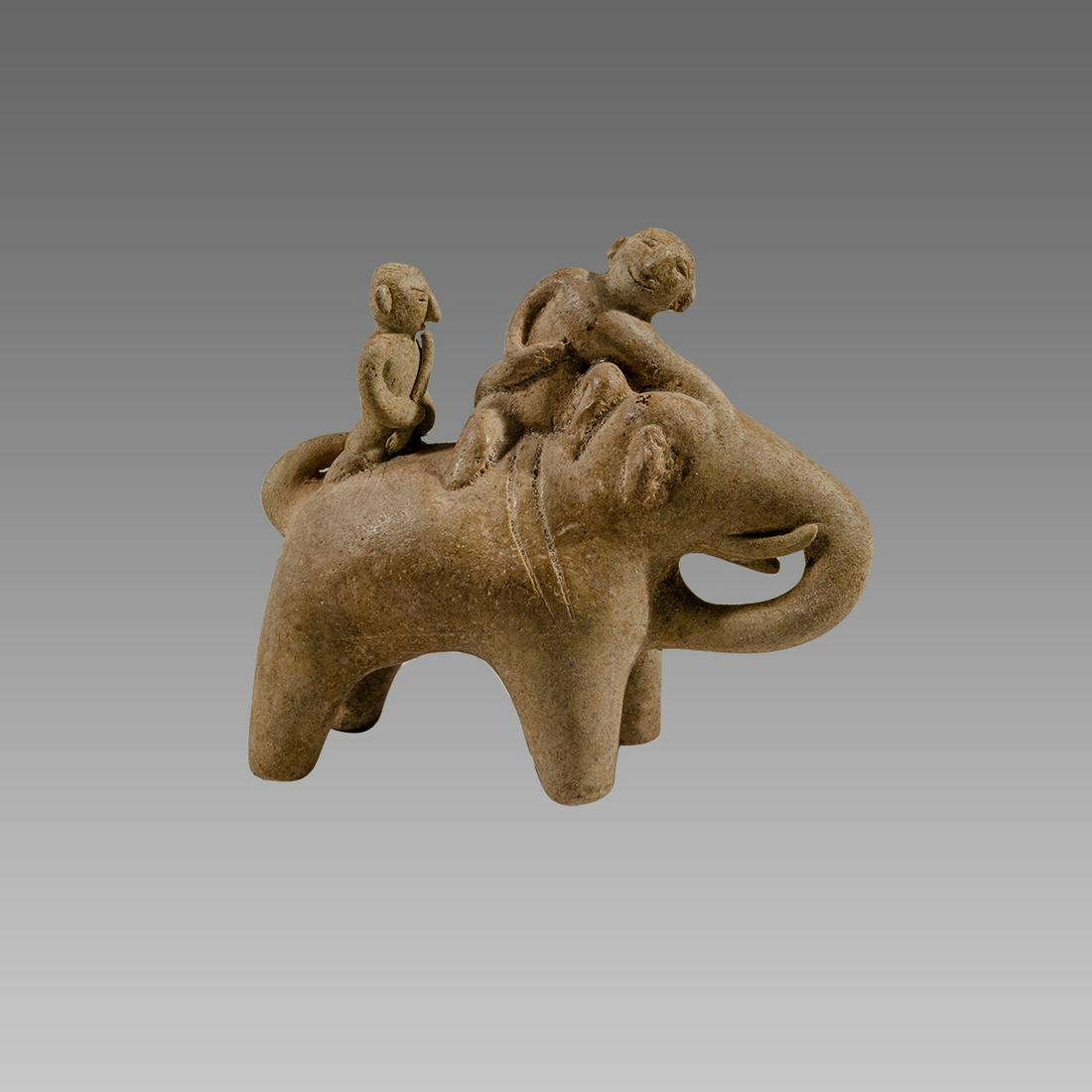 A Thai, Sawankhalok Pottery Elephant two Riders c.14th: A Thai, Sawankhalok Pottery Elephant two Riders c.14th to 16th century. Size 5 inches length, 4 1/2 inches high. Fine pottery Elephant with two riders. Provenance: Ex Private Maryland collection.