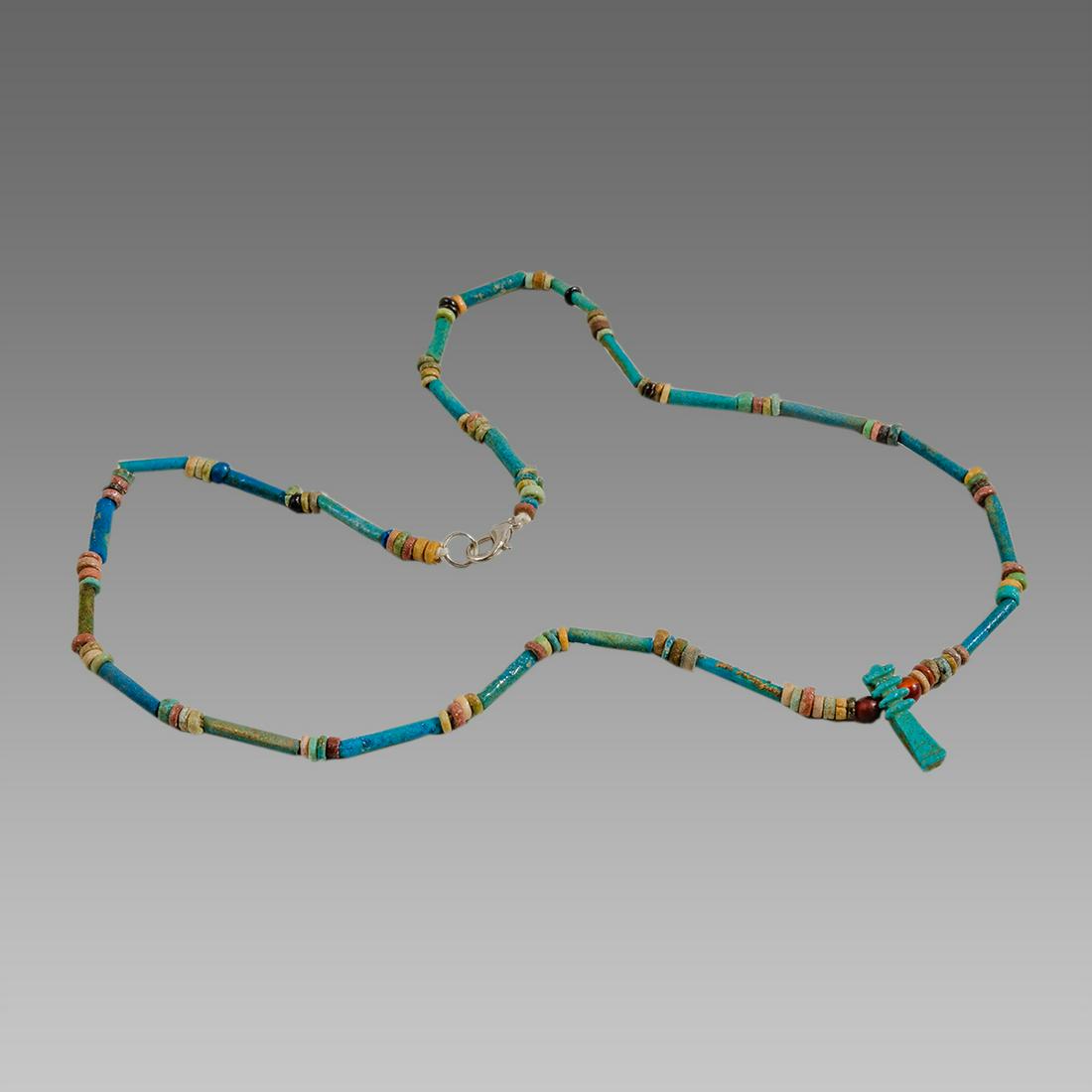 Ancient Egyptian Faience Beads Necklace with Djed: Ancient Egyptian Faience Beads Necklace with Djed Amulet c.300-50 BC. Size 19 3/4 inches length. Great Looking single strand Faience Beads necklace late period 300-50 BC, with Djedt pillar amulet. Pro