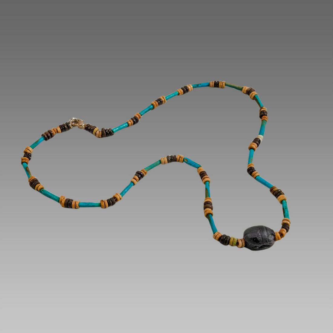 Ancient Egyptian Faience Beads Necklace with Scarab: Ancient Egyptian Faience Beads Necklace with Scarab c.300-50 BC. Size 20 1/4 inches length. Great Looking single strand Faience Beads necklace late period 300-50 BC, with stone scarab. Provenance: Ex