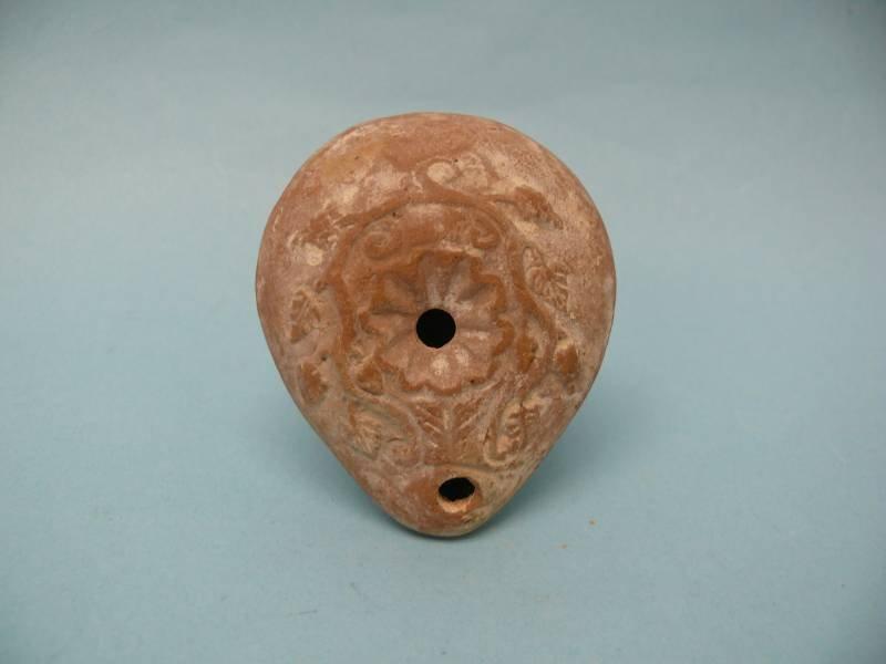 Ancient Roman Egypt Terracotta Oil Lamp c.2nd century: Ancient Roman Egypt Terracotta Oil Lamp c.2nd century AD. Size 3 inches length. Fine terracotta oil lamp decorated with grapevine. rare... Provenance: Ex Griffin Gallery Ancient Art Florida USA.