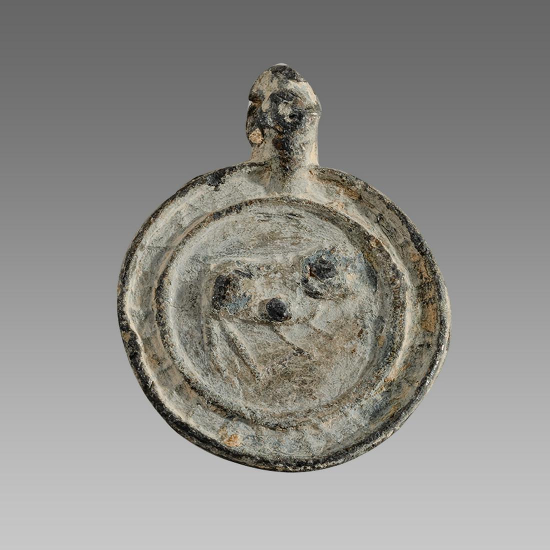 Ancient Greek Lead Amulet with Animal c.1st century BC.: Ancient Greek Lead Amulet with Animal c.1st century BC. Size 1 1/4 inches length. unusual lead amulet with animal, suspension loop. choice patina. Ex Private New York city collection acquired in The N