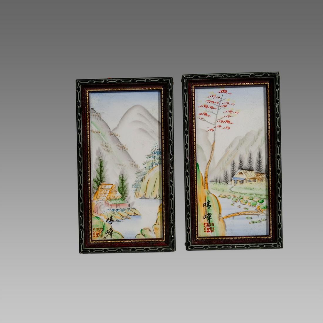 Lot of 2 Chinese Ceramic Plaques in a wooden frame. (1 of 1)