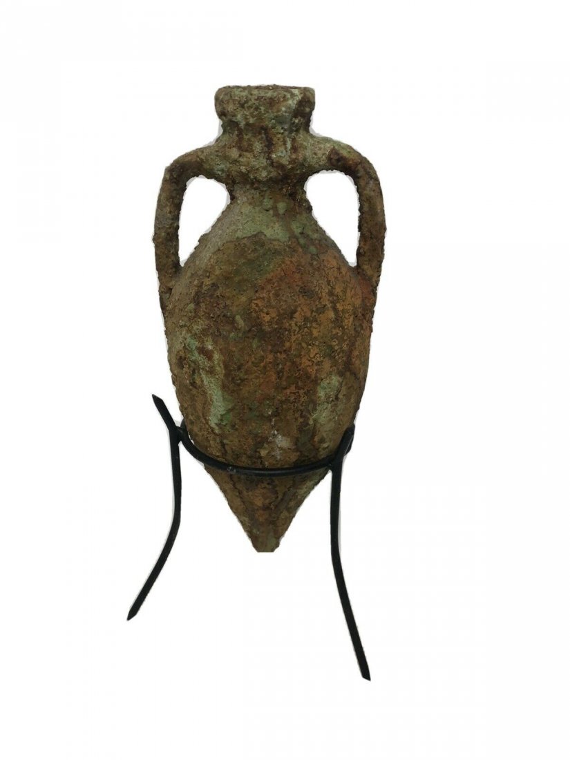 Ancient Roman Sea Salvage Amphora c.1st-2nd cent AD: Ancient Roman Sea Salvage Amphora c.1st-2nd cent AD. Size 11 inches high + stand. 4 3/4 inches wide. Fine Terracotta Wine amphora with twin handles, sea salvage. custom mounted. Ex Private New York ci