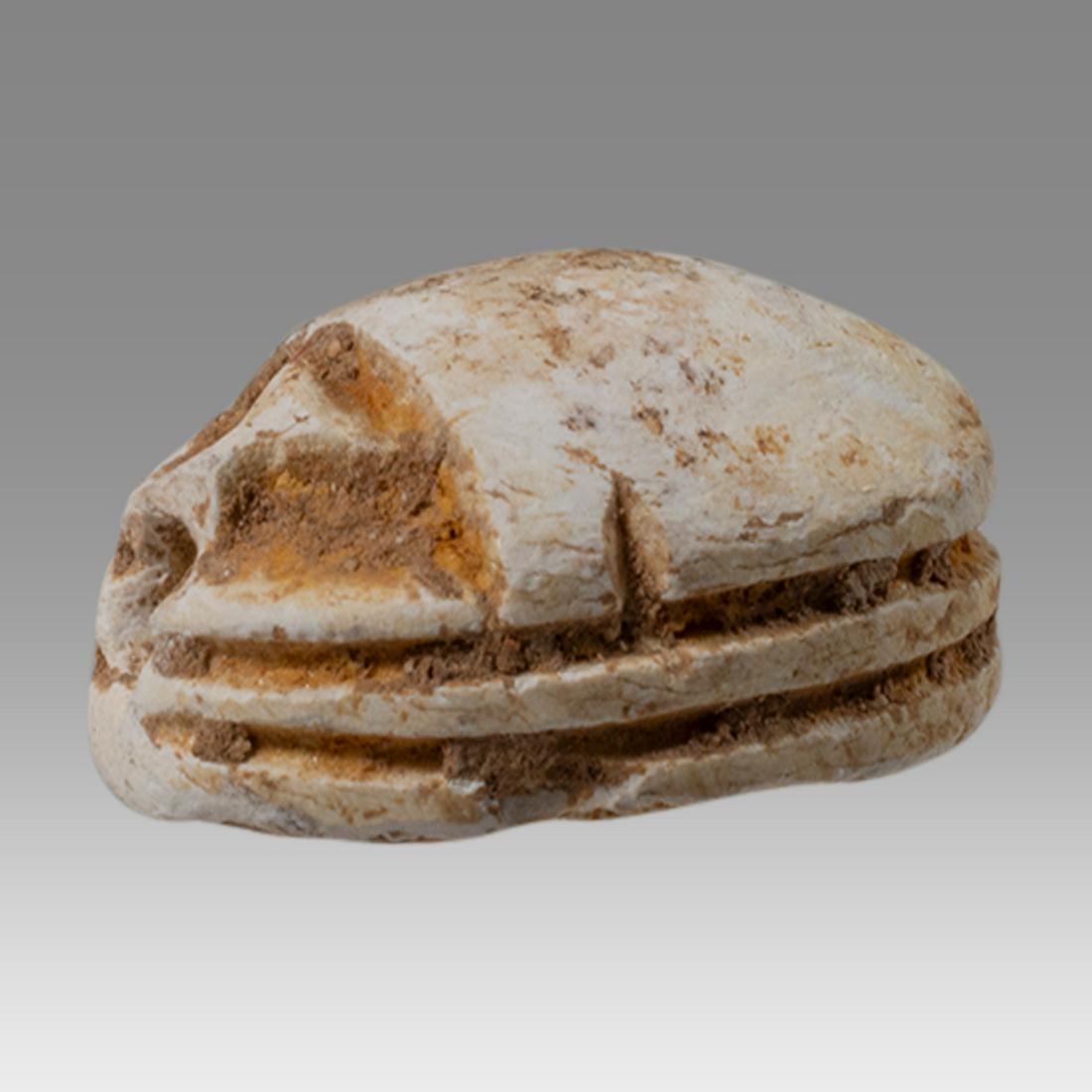 Ancient Egyptian Steatite stone Scarab c.1500-1100 BCE.: Ancient Egyptian Steatite stone Scarab c.1500-1100 BCE. Size 13 x 9 mm. Steatite scarab New Kingdom with stealized beatle back. Provenance: Ex Secret Eyes Gallery New York 1970's-1980's.