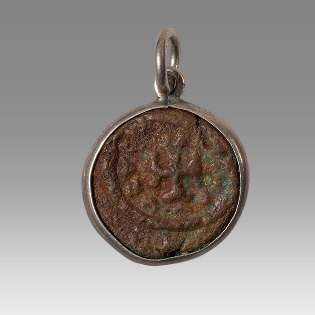 Ancient Byzantine Bronze coin set in silver pendant.: Ancient Byzantine Bronze coin set in silver pendant. Size 17 mm. + suspension loop. Ancient Byzantine bronze coin with Cross, set in modern silver pendant. wearable. Provenance: Ex Secret Eyes Gallery
