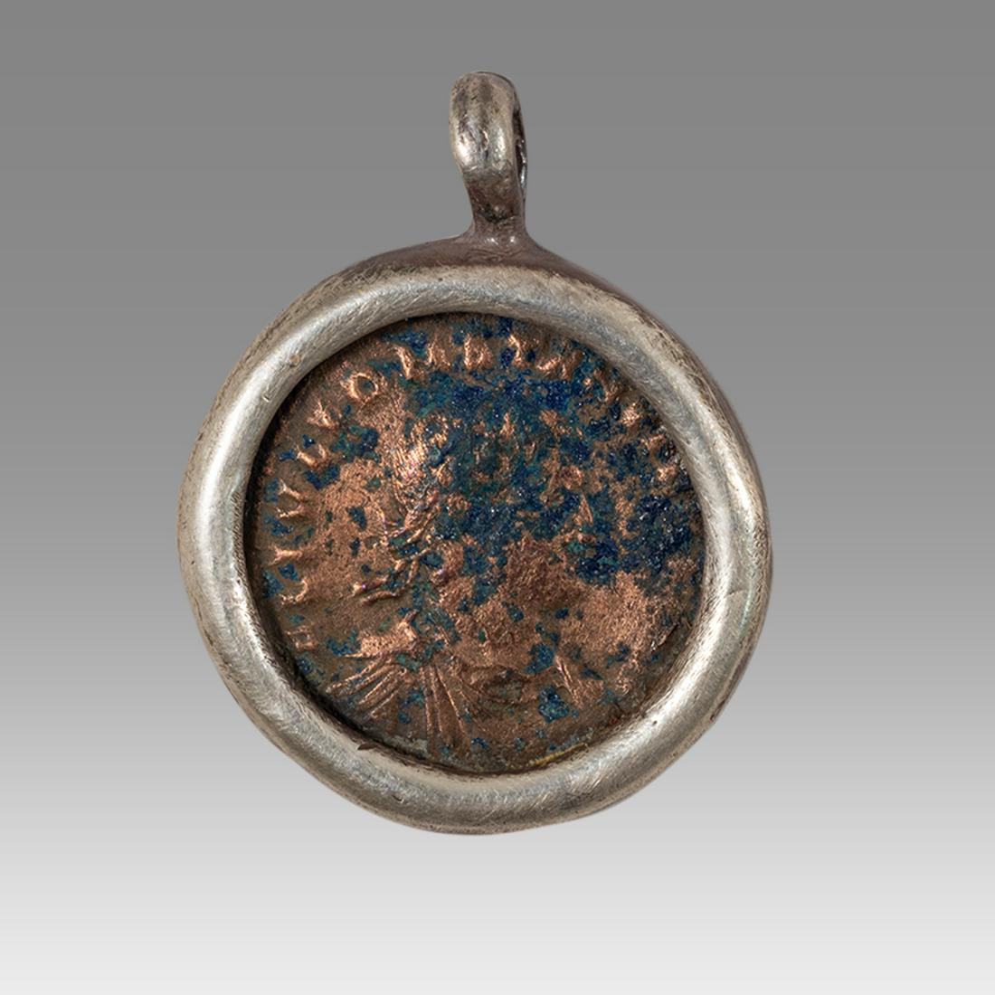 Ancient Roman Bronze coin set in silver pendant. (1 of 2)