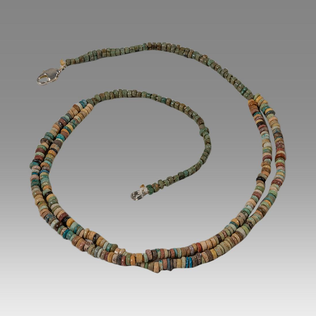 Ancient Egyptian Faience Bead Necklace c.300-50 BC.: Ancient Egyptian Faience Bead Necklace c.300-50 BC. Size 17 1/2 inches length. Great Looking double strand Faience Bead necklace late period 300-50 BC. wearable. Provenance: Ex Secret Eyes Gallery New