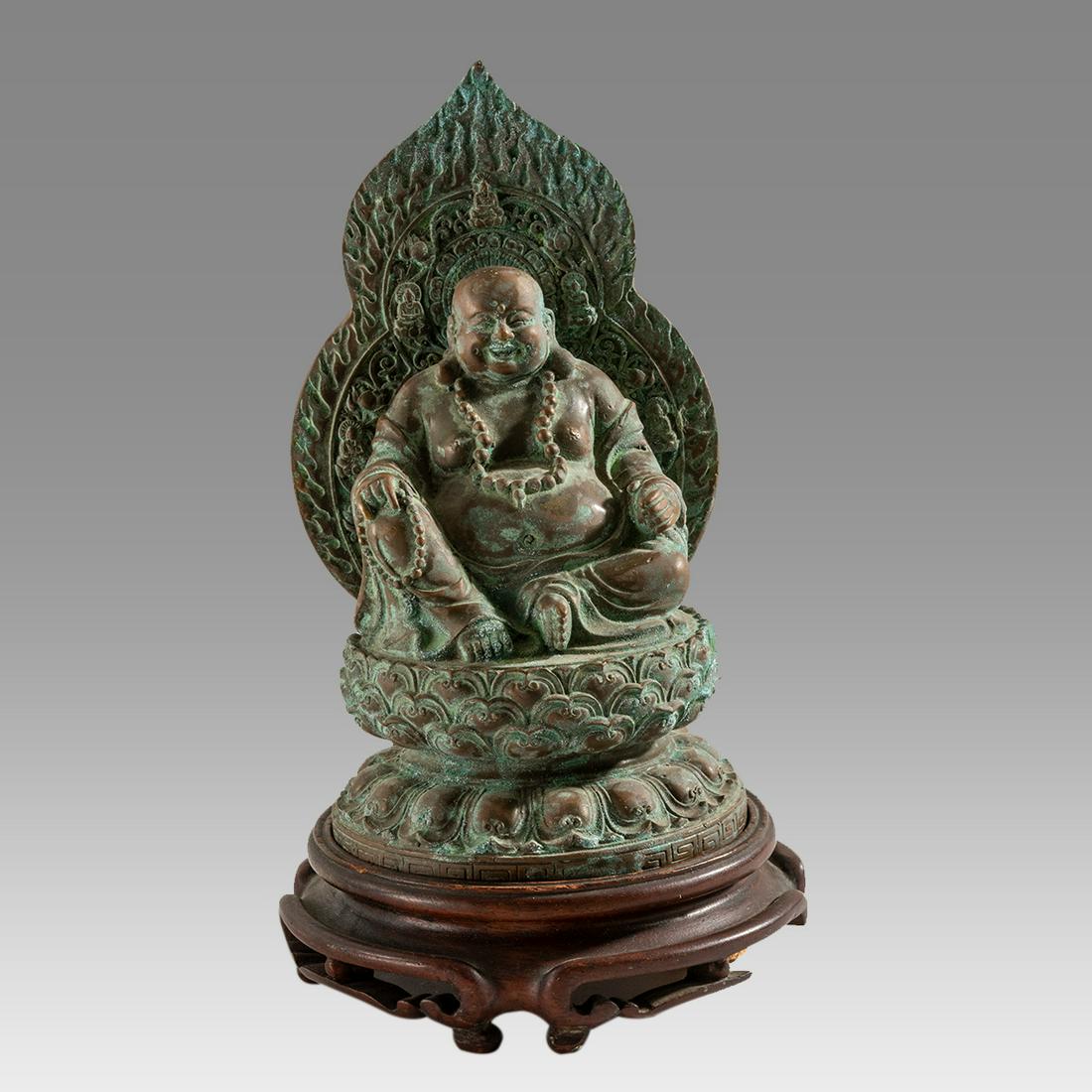Chinese Bronze Happy Putai 19th-20th Century AD: Chinese Bronze Happy Putai 19th-20th Century ADCast version of everyone's favorite Household God, Putai in Chinese or Hotei inJapanese. A jolly figure, exposed belly and bald pate, richly adorned in j