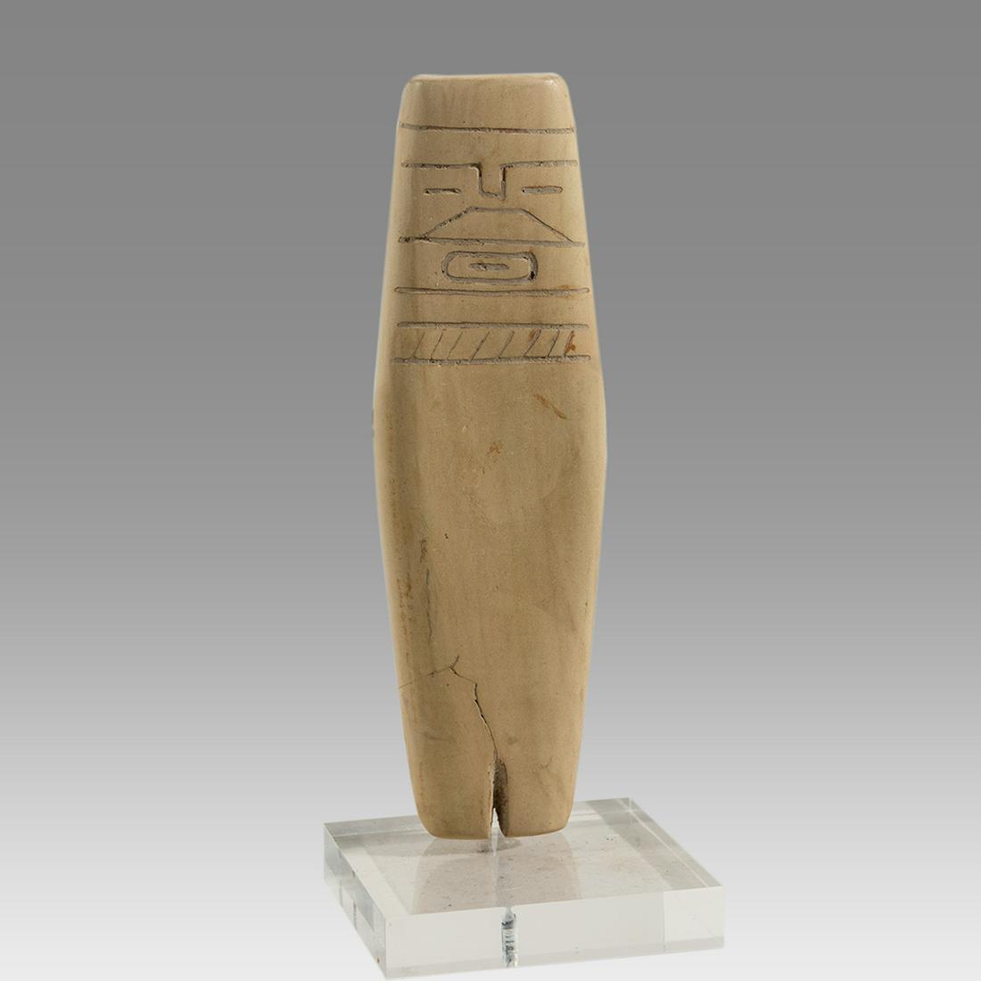 Valdivian Stone Abstract Figural: Valdivian Stone Abstract Figural Form Possibly Ancient? Ecuador, a carved abstract plank shape form in light greenstone the body mildly suggestive with an incision at neck, the face with complex incis