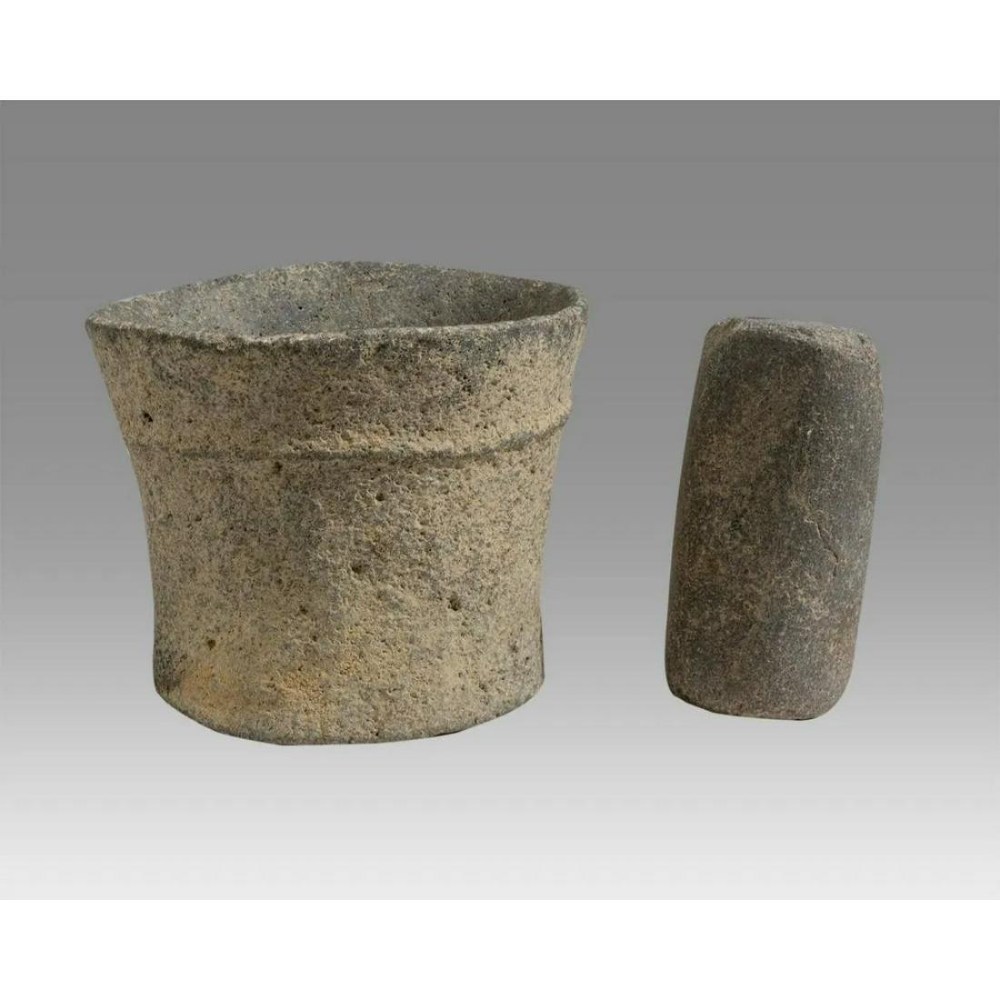 Basalt Stone Mortar and Pestle Chalcolithic 4th: Basalt Stone Mortar and Pestle Chalcolithic 4th Millennium B.C.Of tapering cylindrical form, the top recessed to form a shallow basin with a carved â€œrope” band exterior around size: 5 inch