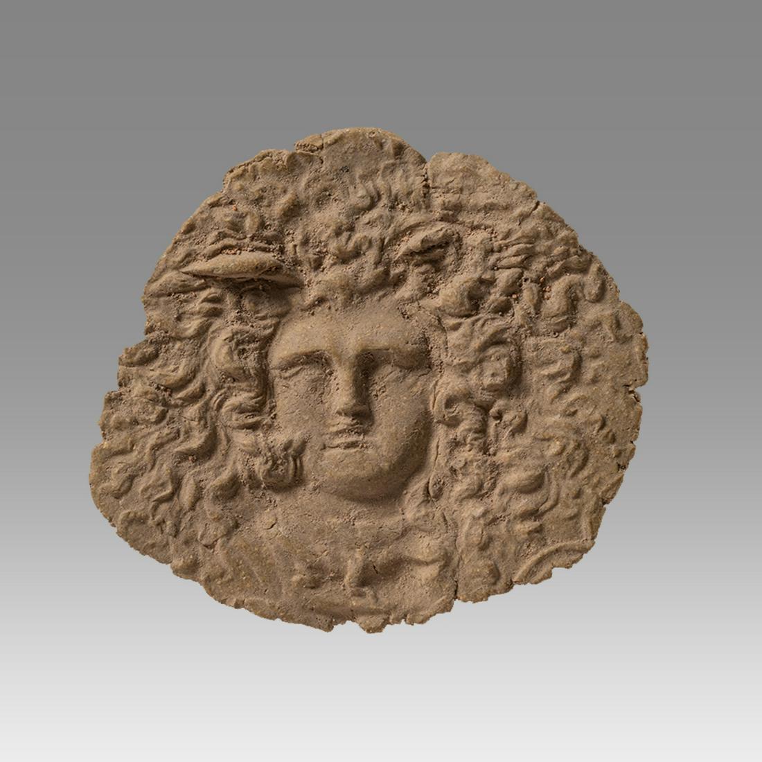 Lead Roundal of Medusa Probably Roman.: Lead Roundal of Medusa Probably Roman. Size 2 1/4 inches diameter. Provenance: Franke Zollman MD USA. Ex Helios Gallery.