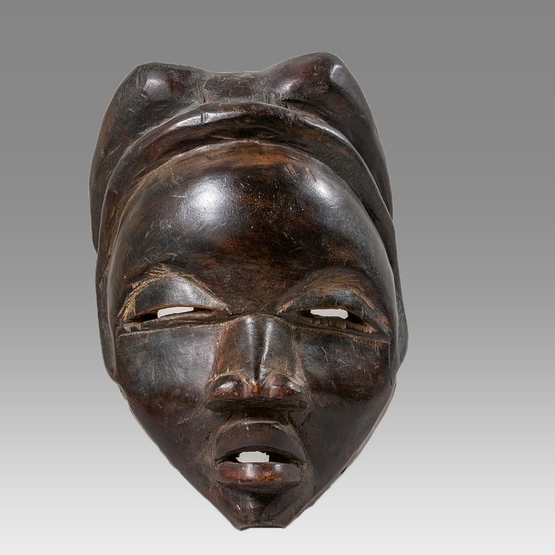 West Africa, Wood mask Dan Guere c.20th century. (1 of 3)